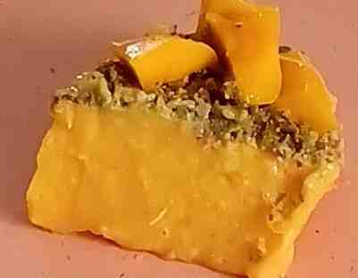 A piece of ataulfo mango yogurt cake