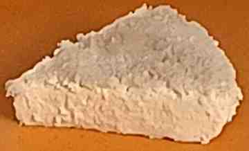 A piece of orange yogurt cake