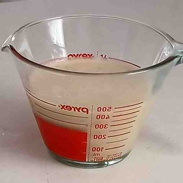 pour the mix in measuring cup
