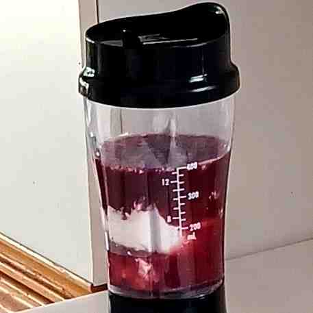 pomegranate juice and yogurt in blender