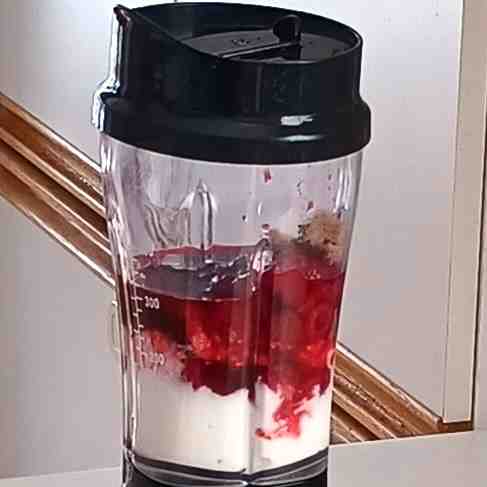 raspberries, yogurt and brown sugar in blender